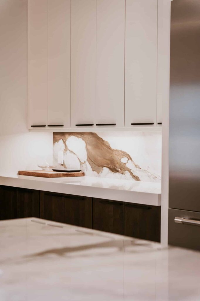 Kitchen: lit onyx backsplash (Alliance Construction remodel, Southwest Florida)