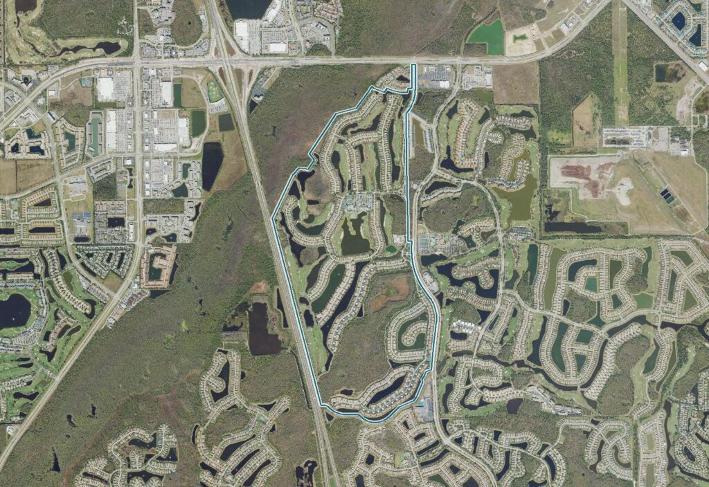 Aerial view of Colonial Country Club, Fort Myers, FL, with the community boundary outlined