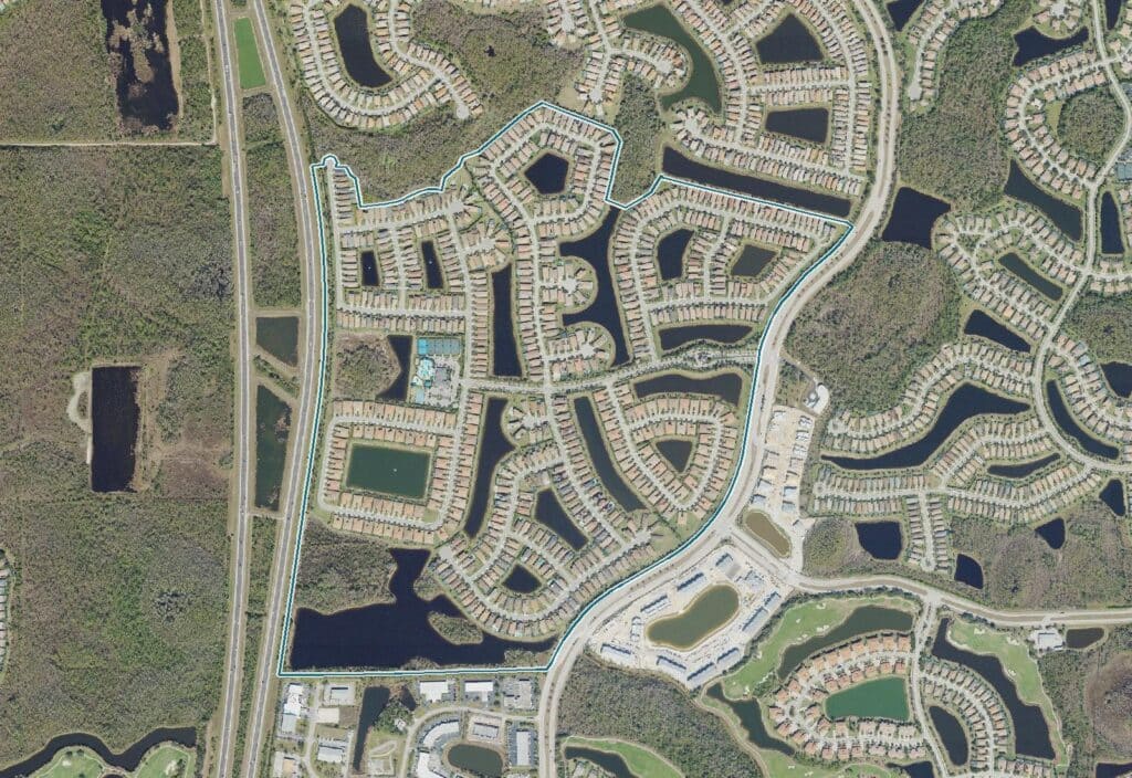 Aerial view of Marina Bay, Fort Myers, FL, with the community boundary outlined