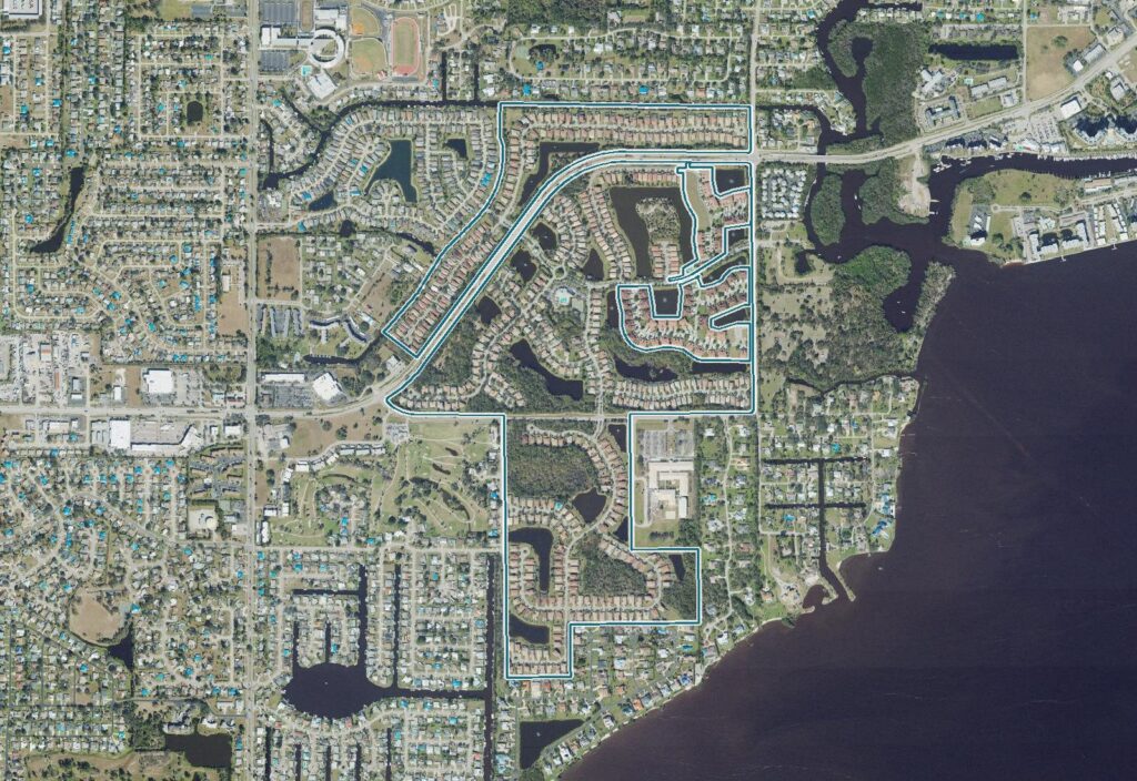 Aerial view of Moody River Estates, North Fort Myers, FL, with the community boundary outlined